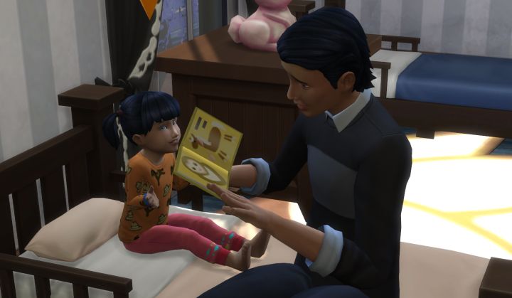 Reading a bedtime story to a toddler in The Sims 4